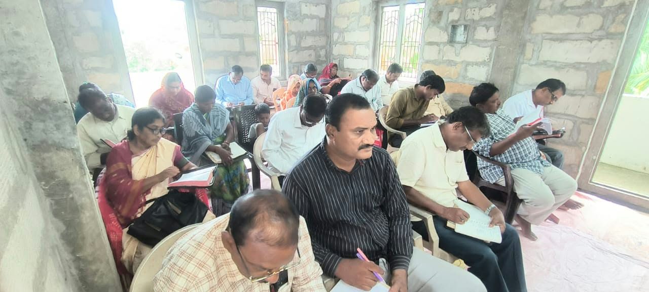 Naveen's students taking notes in class in Samarlakota, India